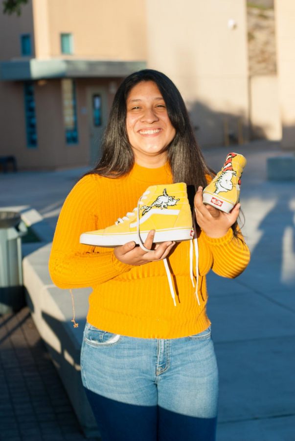 OH, THE PLACES SHE’LL GO: Check out how senior Brianna Vasquez personalized her sneakers by scanning the ZAPPAR logo on the newspaper.