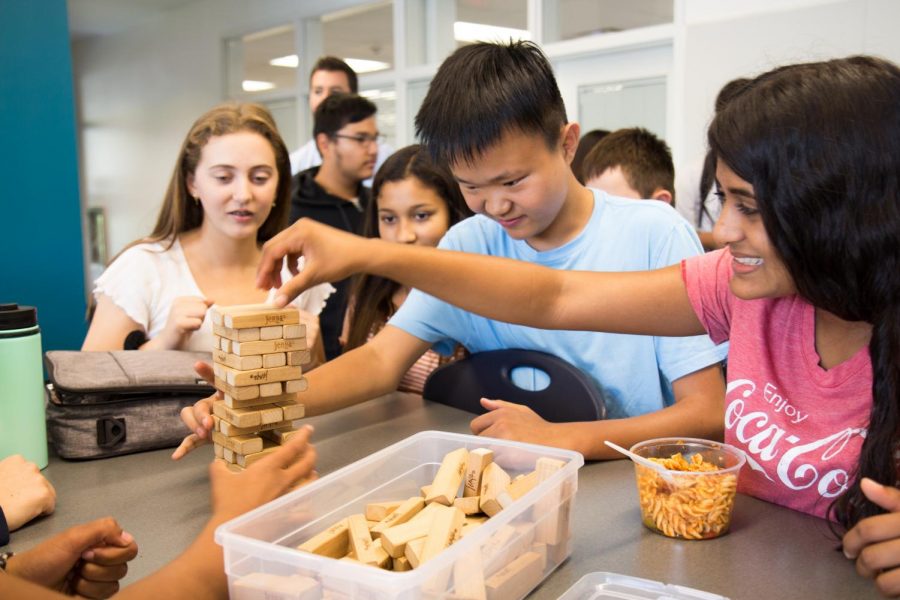 COM(PACK)SION: Club members socialize through games such as Jenga.