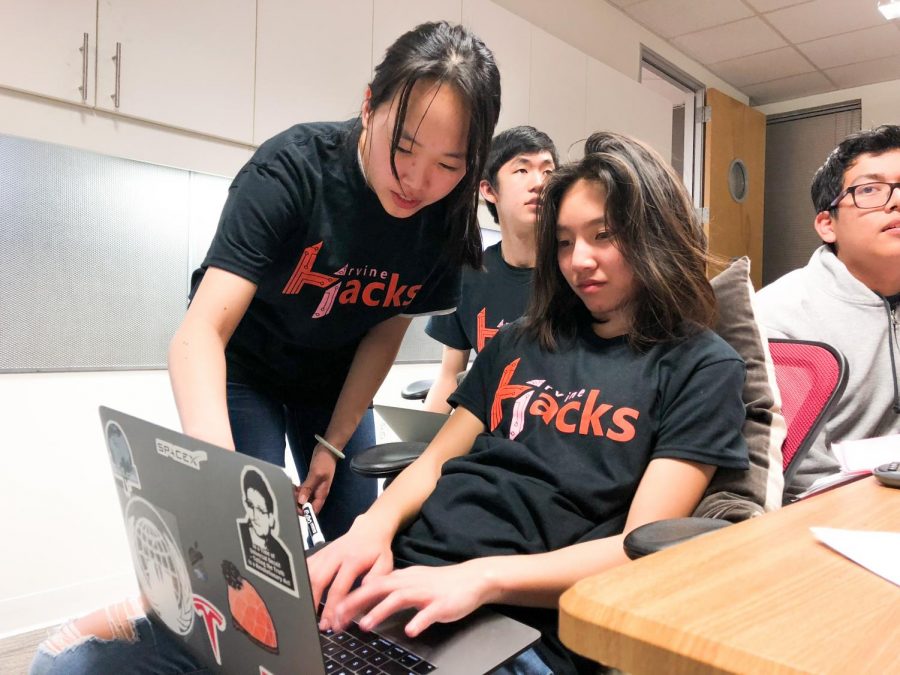 CYBERSECURITY: Juniors Tiffany Sun and Emma Li debug an
error in their antivirus software by writing code in the C++ language.