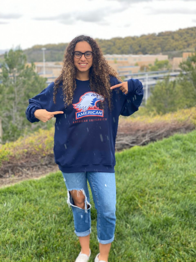 COLLEGE PRIDE: Senior Malak Hassouna shows off her American University gear and plans to pursue Women Studies and Pre-Law.