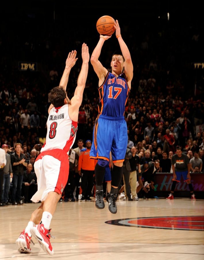 Buzzer beater: Jeremy Lin scores a last-second game winning shot over Jose Calderon.