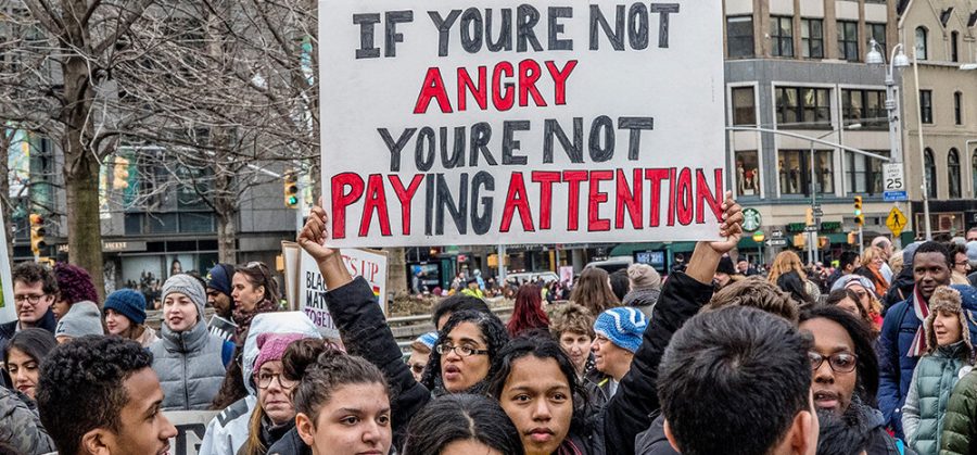 HEAR OUR VOICES: Several protestors gather to bring awareness to sexual assault, harassment and violence issues affecting women around the world.