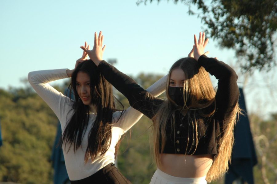 DANCING WITH THE STARS: Junior Calista Nguyen (left) and freshman Caleigh Nystrom (right) dance to lively K-pop.