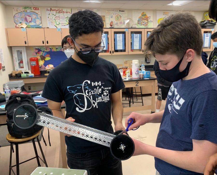 Dream it, build it, do it: Junior Shayan Halder and freshman Hunter Welch work together to make a gravity vehicle, a vehicle powered solely by gravitational potential energy and sheer willpower. 