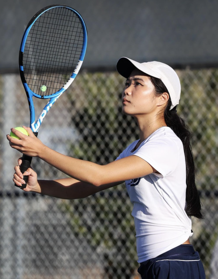ON+PACE+FOR+AN+ACE%3A+Senior+Paula+Zhang+concentrates+intensely+on+creating+a+fluid+motion+for+her+serve+in+the+CIF+Quarterfinals.