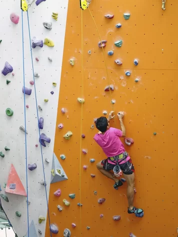 A COLORFUL CHALLENGE: The bright Aesthetic Climbing Gym may appear calm, but don’t be fooled until you face the challenge of climbing their walls. 