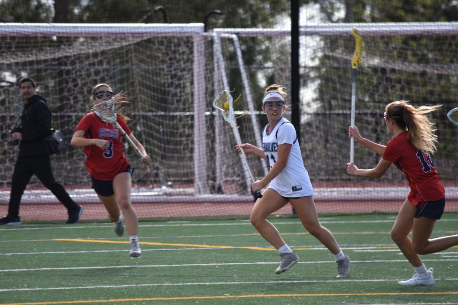 FOR THE SCORE: Captain senior Amelia Wagner leads the charge against Beckman High School. 