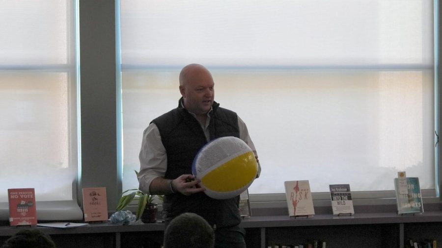 KEEPING THE BEACH BALL ALOFT: Grief survivor Arik Housley uses the metaphor of holding a beach ball underwater to explain the futility of suppressing grief.