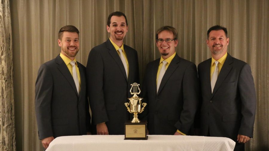 (B)ROCKING OUT IN STYLE: Vernon Brock (far right) places fourth with his quartet, VOX, at the Barbershop Harmony Society competition in 2018. 