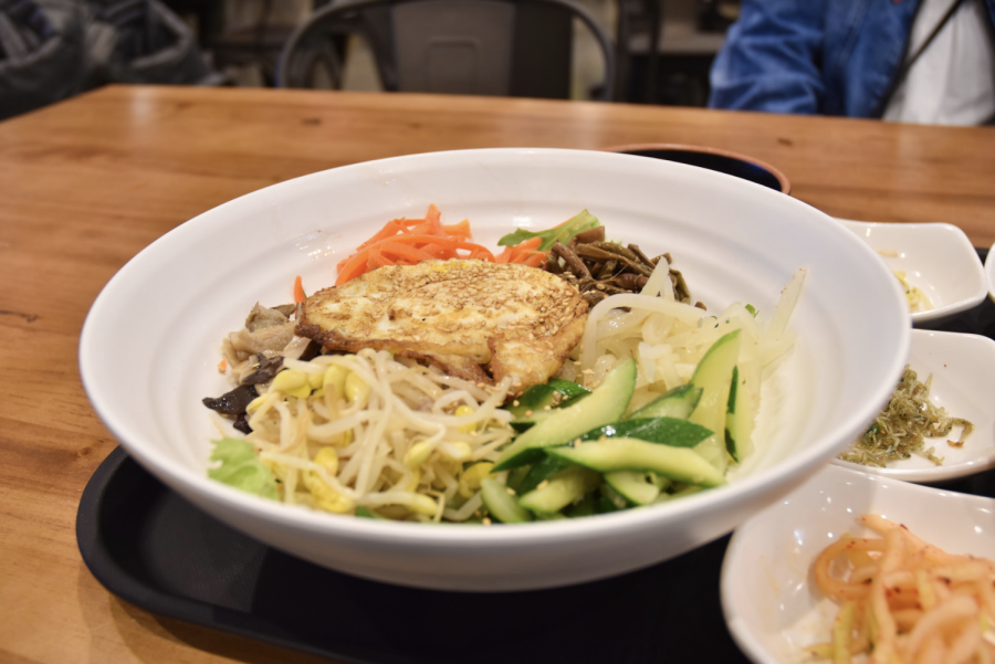 BIBIMBAP: This delectable dish is the mixing of many vegetables with rice and chili sauce to create a wonderful new concoction.