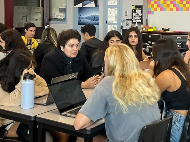 MELTING DOWN ICE: ICE teacher Nicole Midani engages with her students to explain how students can help stop climate change.