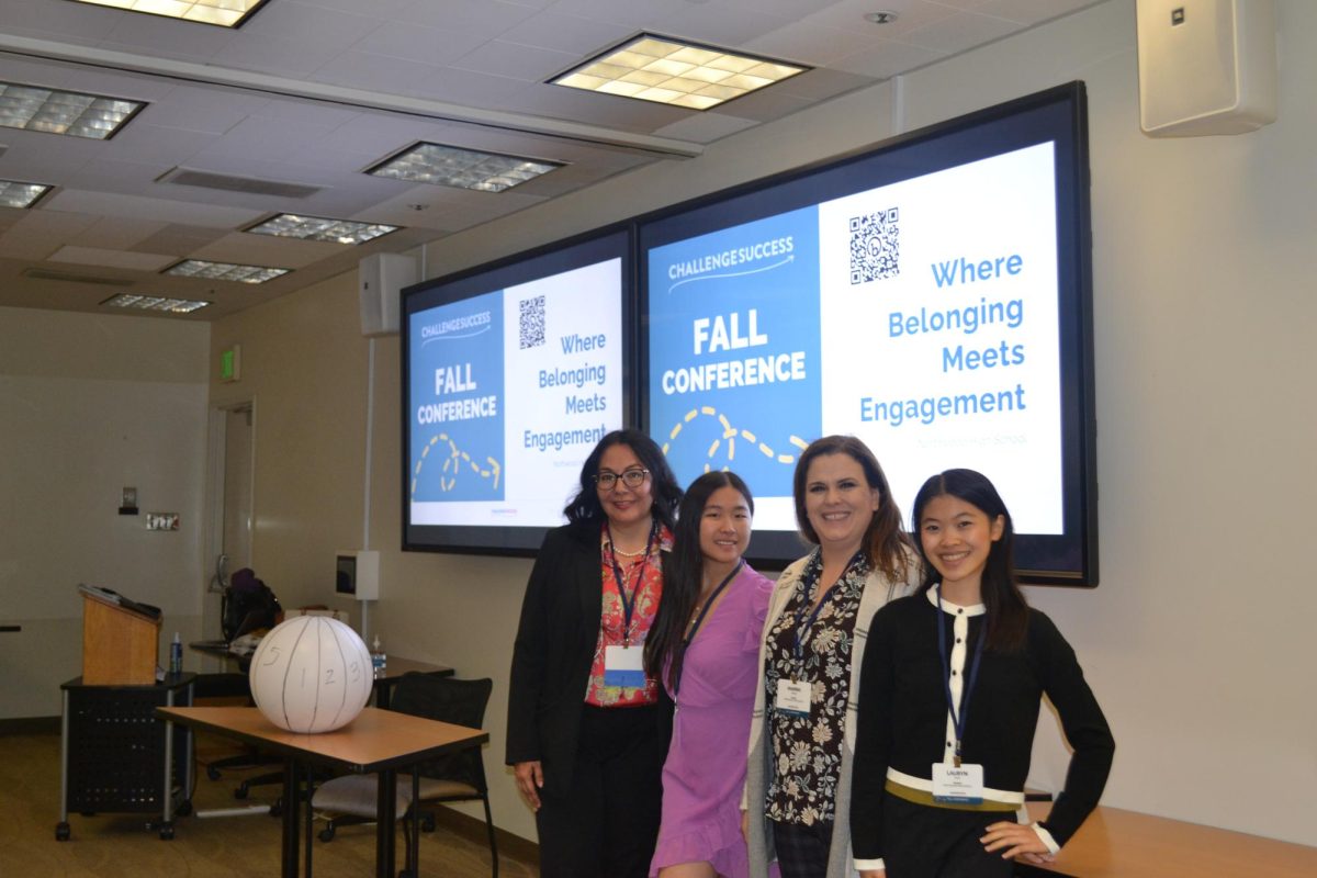 GEARING UP FOR SUCCESS: Christina Banagas, senior Kristen Lew, Marina Alburger and sophomore Lauryn Chew pose for a photo after their presentation on student well-being and engagement. (Photo courtesy of Archana Gima) 