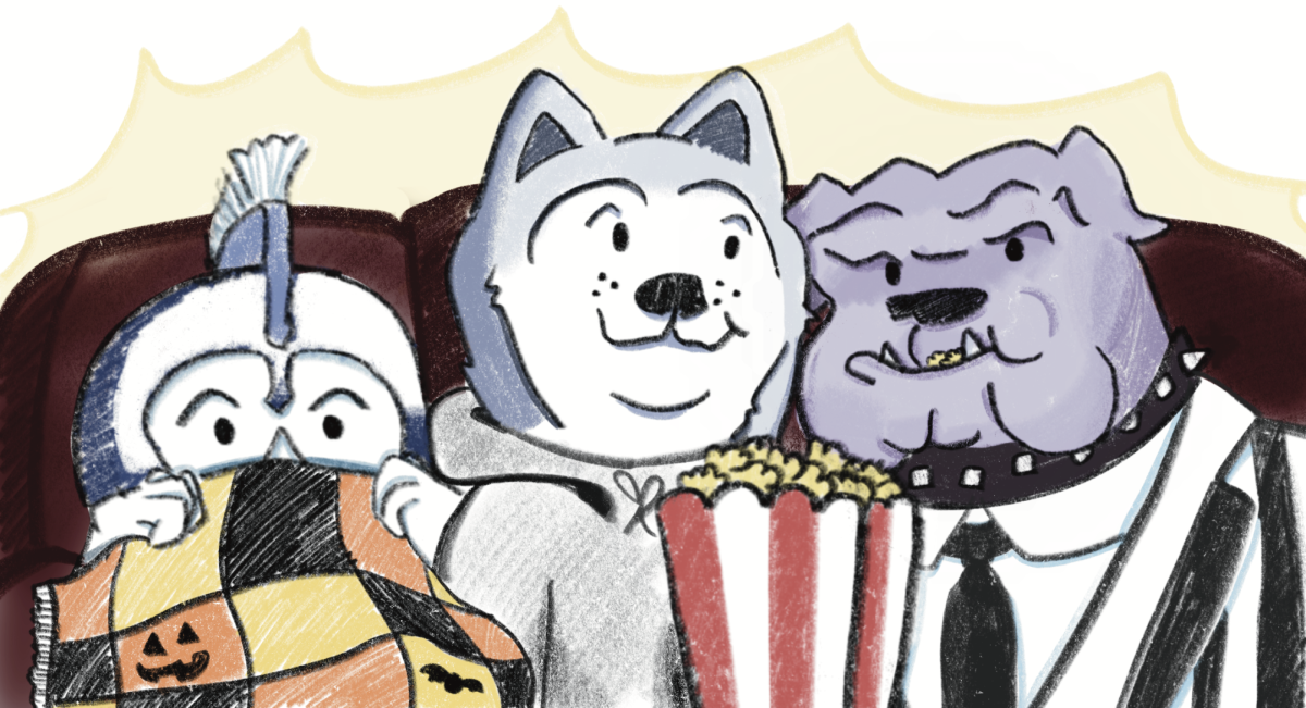 MASCOT MOVIE NIGHT: Tommy the Trojan, Timby and Buster enjoy a (mostly) scare-free movie. 