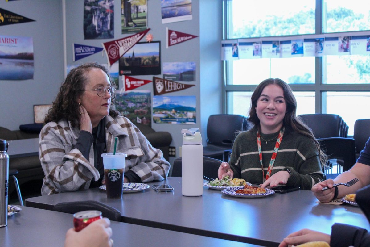 Laughing and Lunch: After a long day of helping and advising students, Northwood counselors  Allison Singer (left) and Bailey Phenicie (right) take a special lunch break together in the College and Career Center to relax and reflect upon their week.
