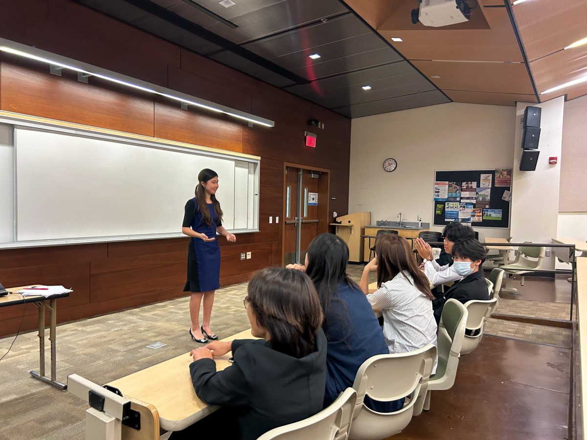 STUNNING SPEECHES: Freshman Lydia Liu expressively delivers her dramatic interpretation to the competitors at the state qualifying tournament.