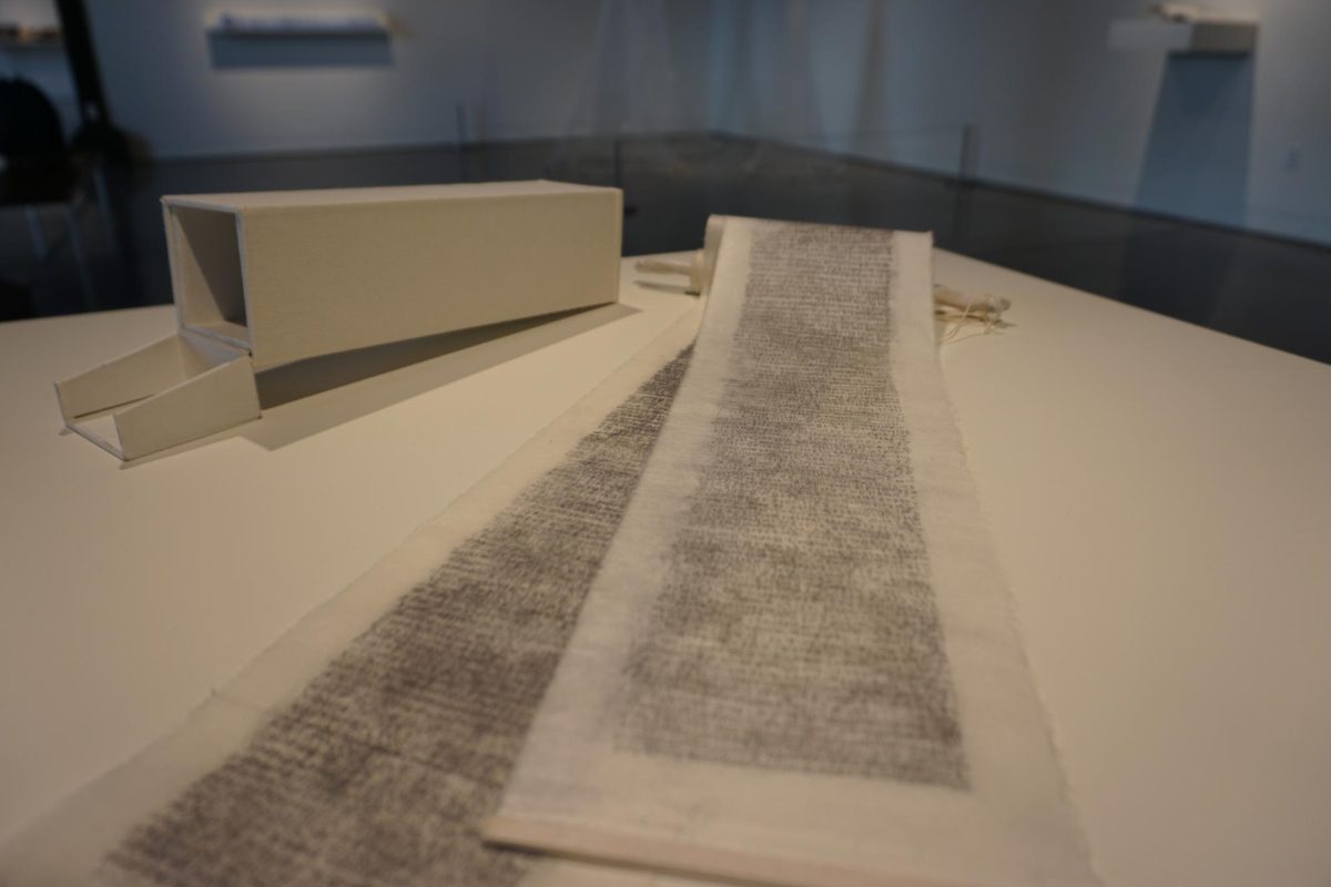 Obituary: for a bigger sleep, for a smaller death, 2023
Made with Intaglio, mulberry, paper, wax, and wood, Suzie Zhu handwrote the compact characters onto a small scroll