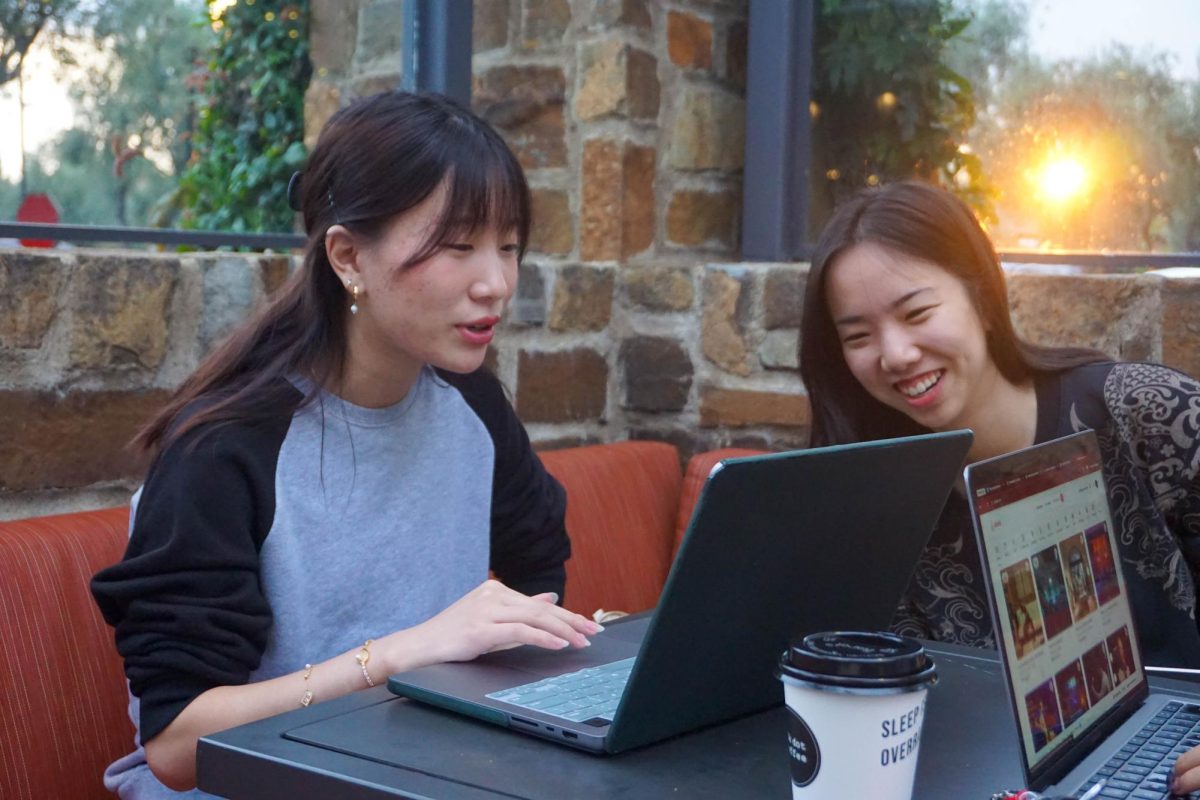 FEMALE FRIENDSHIPS ON AND OFF CAMERA: Director Coco Wu (Northwood Class of 2023) and location manager Nicole Toshima (Northwood Class of 2023) work together during a production meeting to search for locations to film a cabin scene