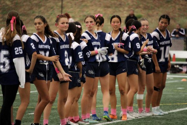 PINK AND PROUD: Northwood’s girls flag football team celebrate pink out and senior night during their final game of the season against Rosary Hill, supporting breast cancer awareness.