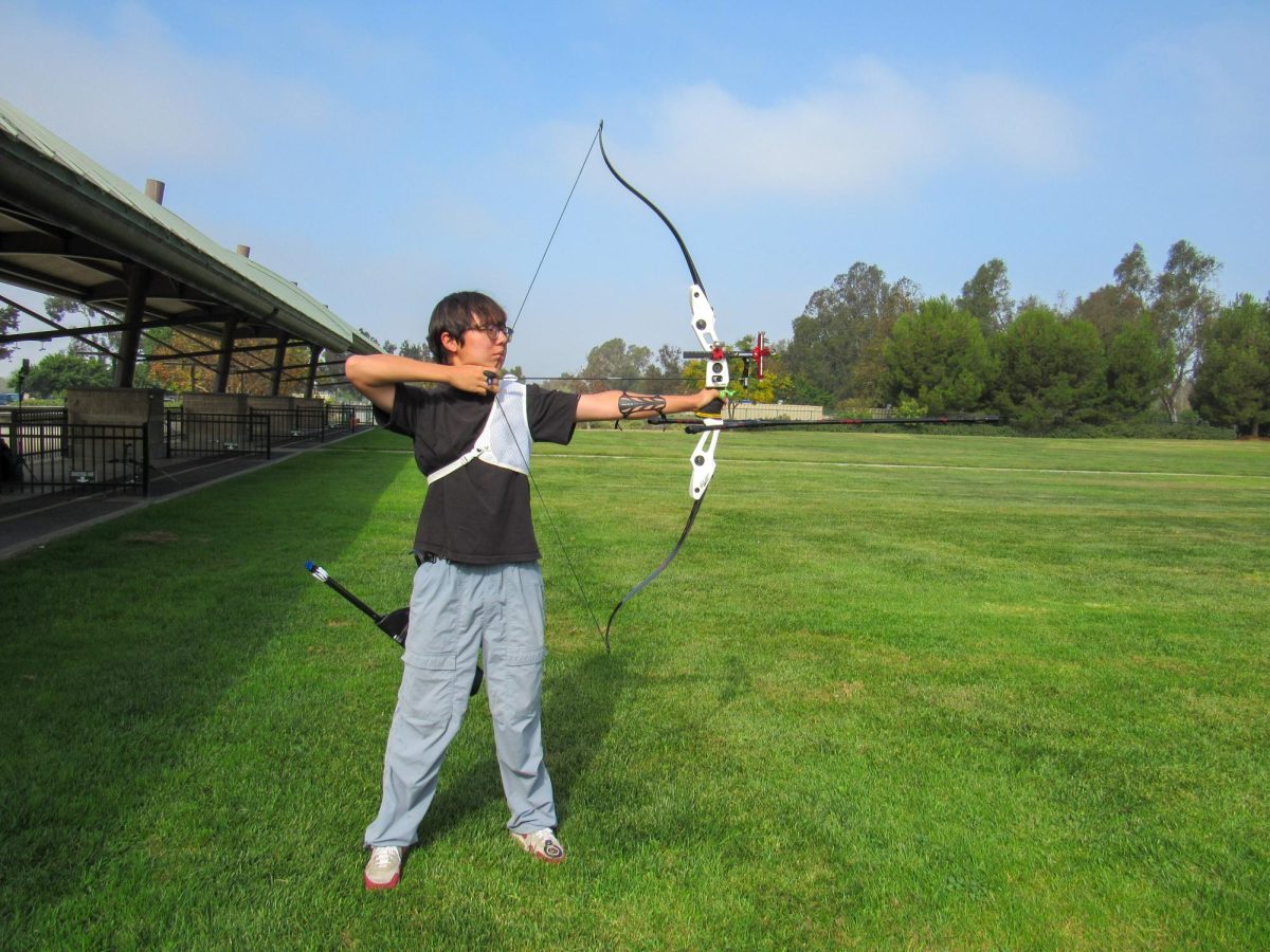 BULLSEYE BEAST: Sophomore Ryan Koo practices shooting at Mile Square Regional Park Archery Range