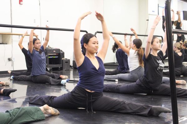 DANCING WITH SERENITY: Sophomore Grace Li refines her moves in her fourth period dance choreography class.