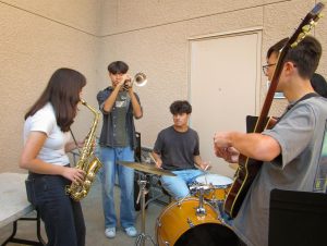 YA LIKE JAZZ?: Northwood’s Jazz Junction showcases their musical talent with an improvisation led by Junior Sooho Cho (center left) and Senior Drew Maragay (center right) at Northwood’s Club Rush.