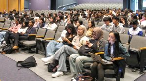 BATTLE OF THE ADVISEMENTS: during a student forum meeting, 15 individuals from different advisements volunteer to play a game of musical chairs in order to win a pie party. 