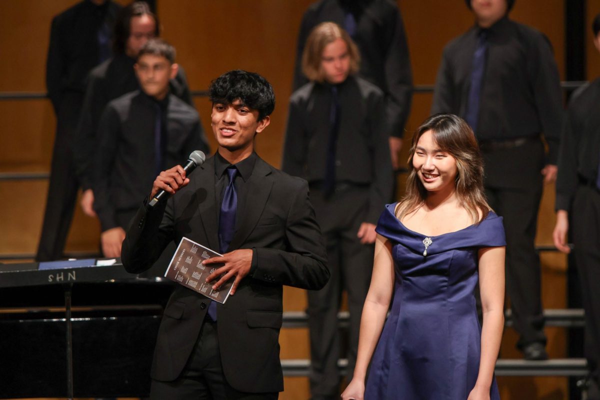 SETTING THE STAGE: Choir co-presidents seniors Ronith Anand and Jane Wang, the program’s first ever student emcees, guide the audience through each piece of Northwood’s Winterfest concert.