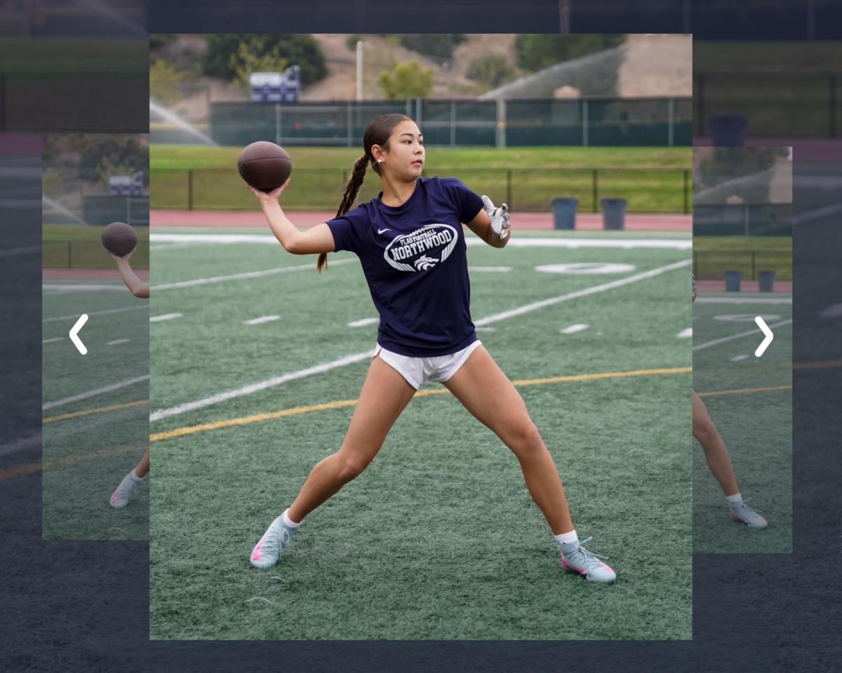 CALLING THE SHOTS: Freshman Jocelyn Lee plays quarterback during a mixed summer practice.