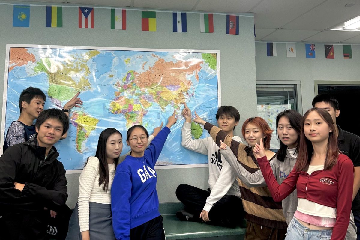 DELEGATION OF HOSPITALITY: Northwood’s 2023 Language Ambassadors point to their countries of origin—diverse like the English Learner students the program began mentoring that year.