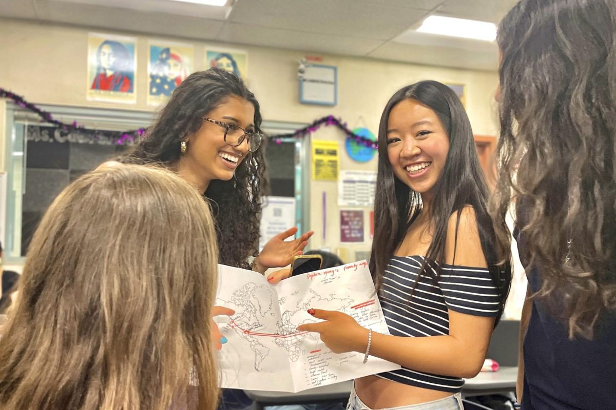 BROADENED LENS: Senior Sophia Xiong discusses the sociopolitical and cultural context of her family’s immigration to the U.S. with senior Wendy Seefeldt and juniors Zaarya Vaid and Tamana Maiwandi.