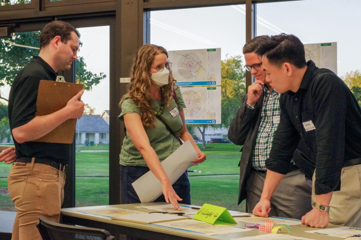 STREET SMARTS: City of Irvine and CR Associates staff listen to a community member’s traffic concerns at the Suggested Routes to School open house on Sept. 4.