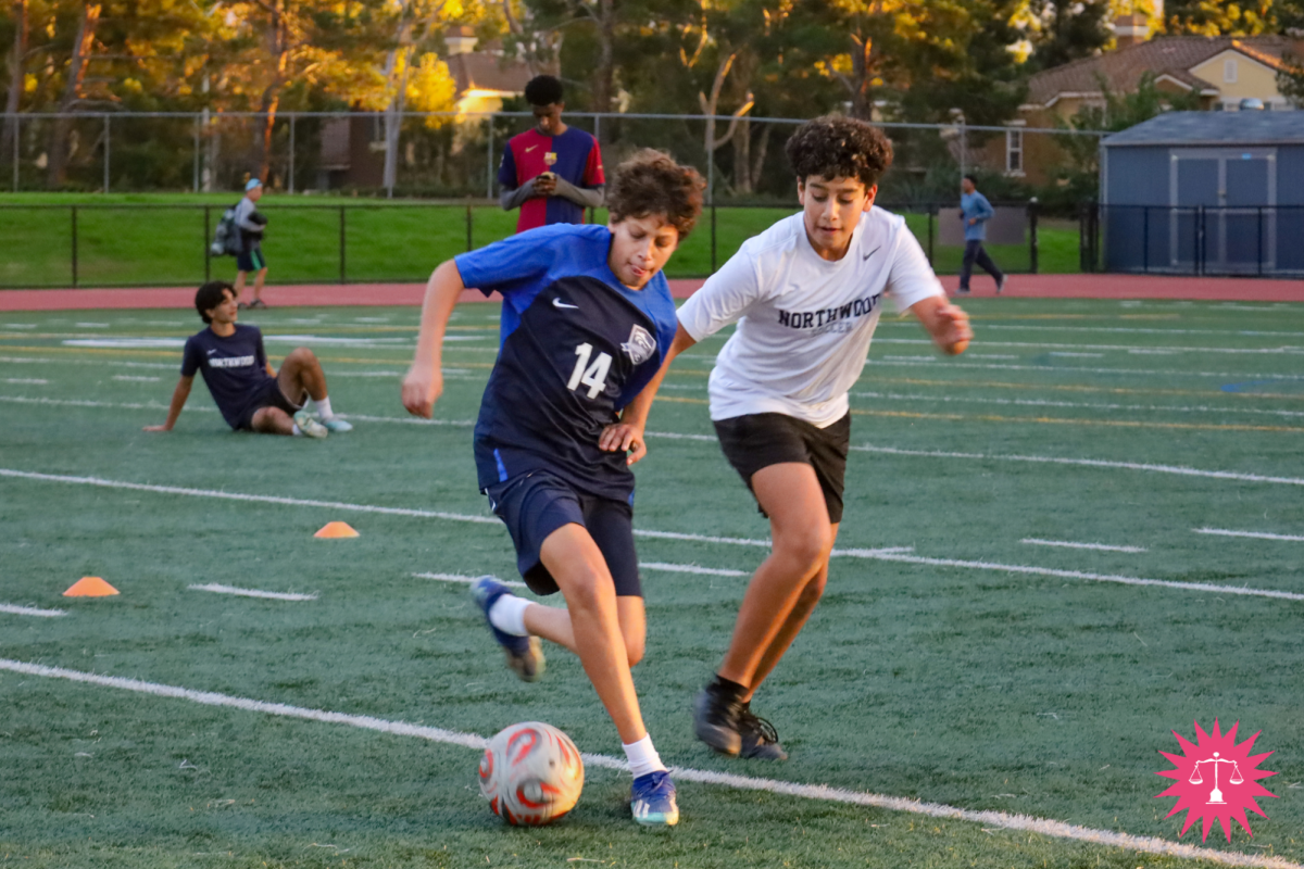 PRESENTS FOR PLAYING: Sophomore Yahya Ahmad and freshman Yassir Sultan compete in the first round of the tournament.