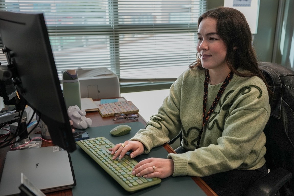 LENDING A HELPING HAND: Counselor Bailey Phenicie helps students with their questions through email.