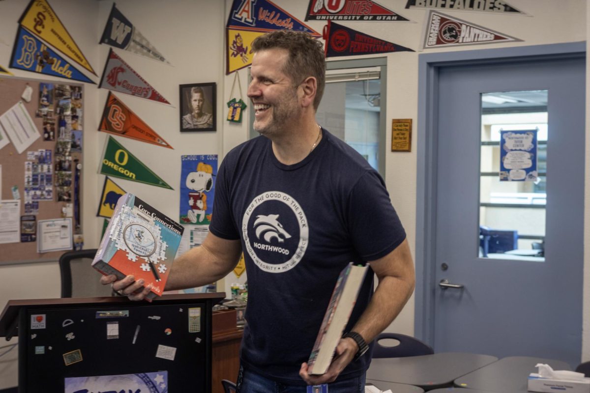 IT’S ALL ADDING UP: Math teacher Chris Di Antonio is quite used to the weight of teaching multiple classes.