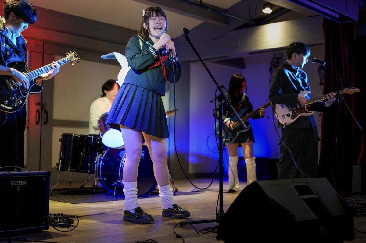 Rei Iwai (lead vocal), Minkee Han (lead guitar), Jack Kim (drums), Sinbi Yin (bass) and Jay Lee (second vocal/second guitar) perform at Battle of the Bands at Heritage Park Community Center on Feb. 20.