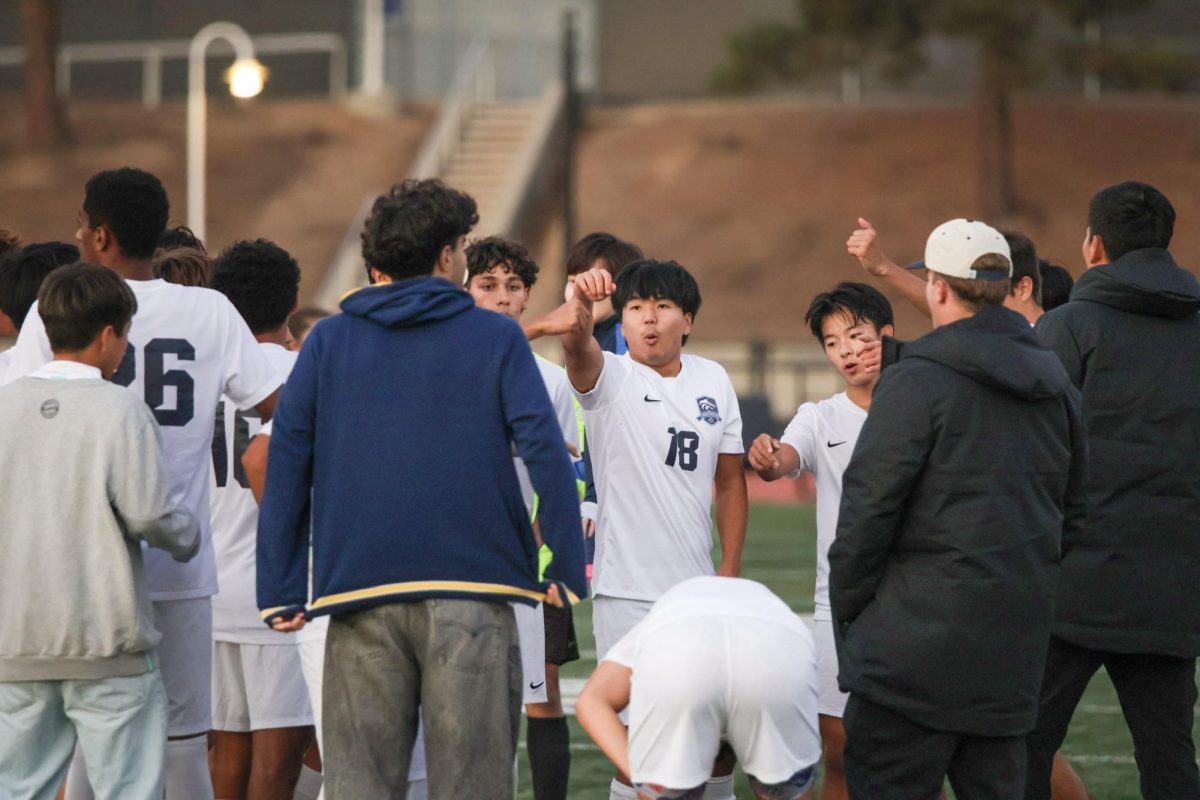 AFTER SUNSET: Boys soccer plays late into the night, with limited light shining in from Northwood’s upper campus.