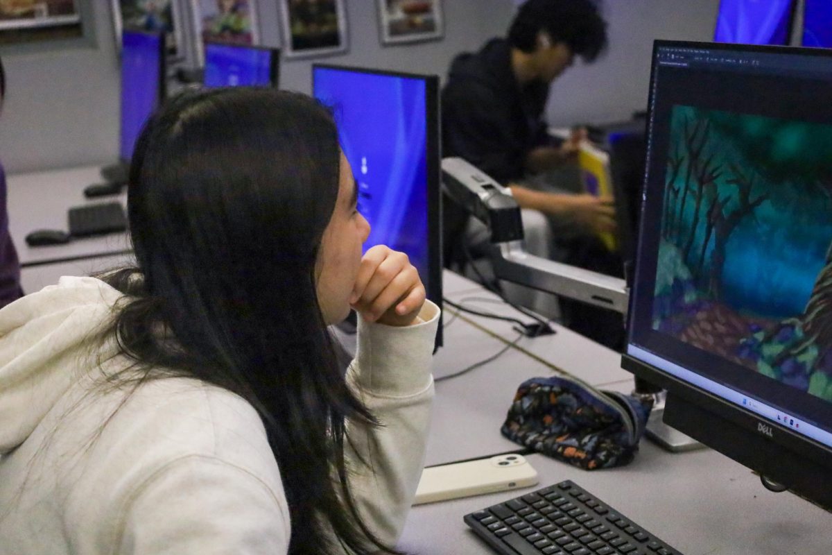 MEDIA MASTERY: Junior Madeline Cheng builds an immersive scene in her Digital Media Arts class.