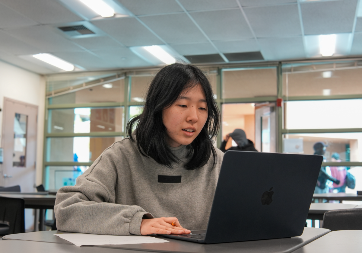 FRICTION-MAXXING: Senior Audrey Hong prepares for the F=ma competition by reviewing key concepts with digital flashcards.